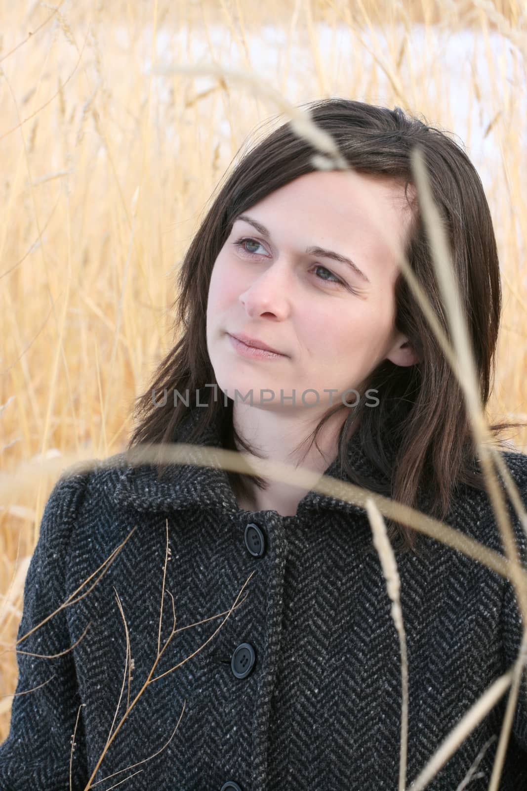 Adult brunette female in a rural setting