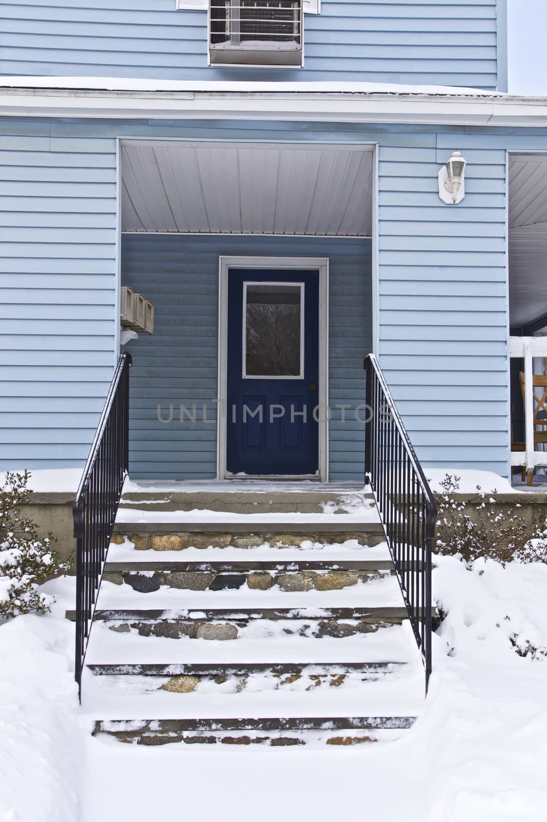Blue weatherboard home, Winter season