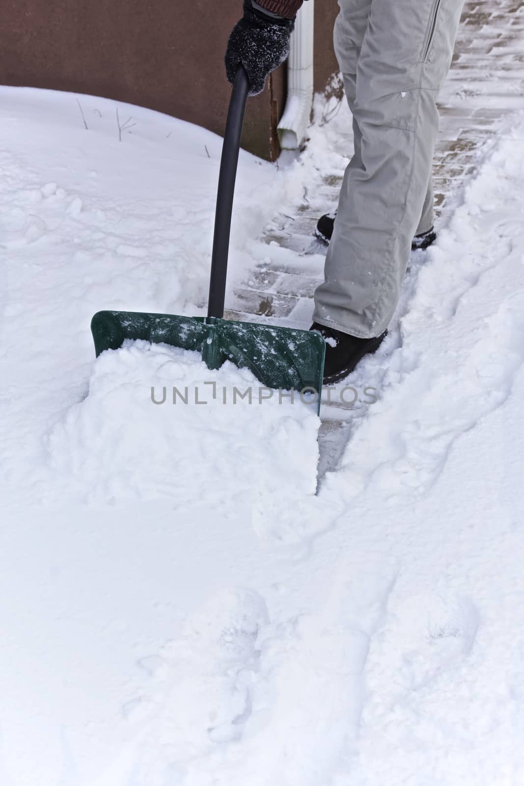 Person clearing snow, Winter