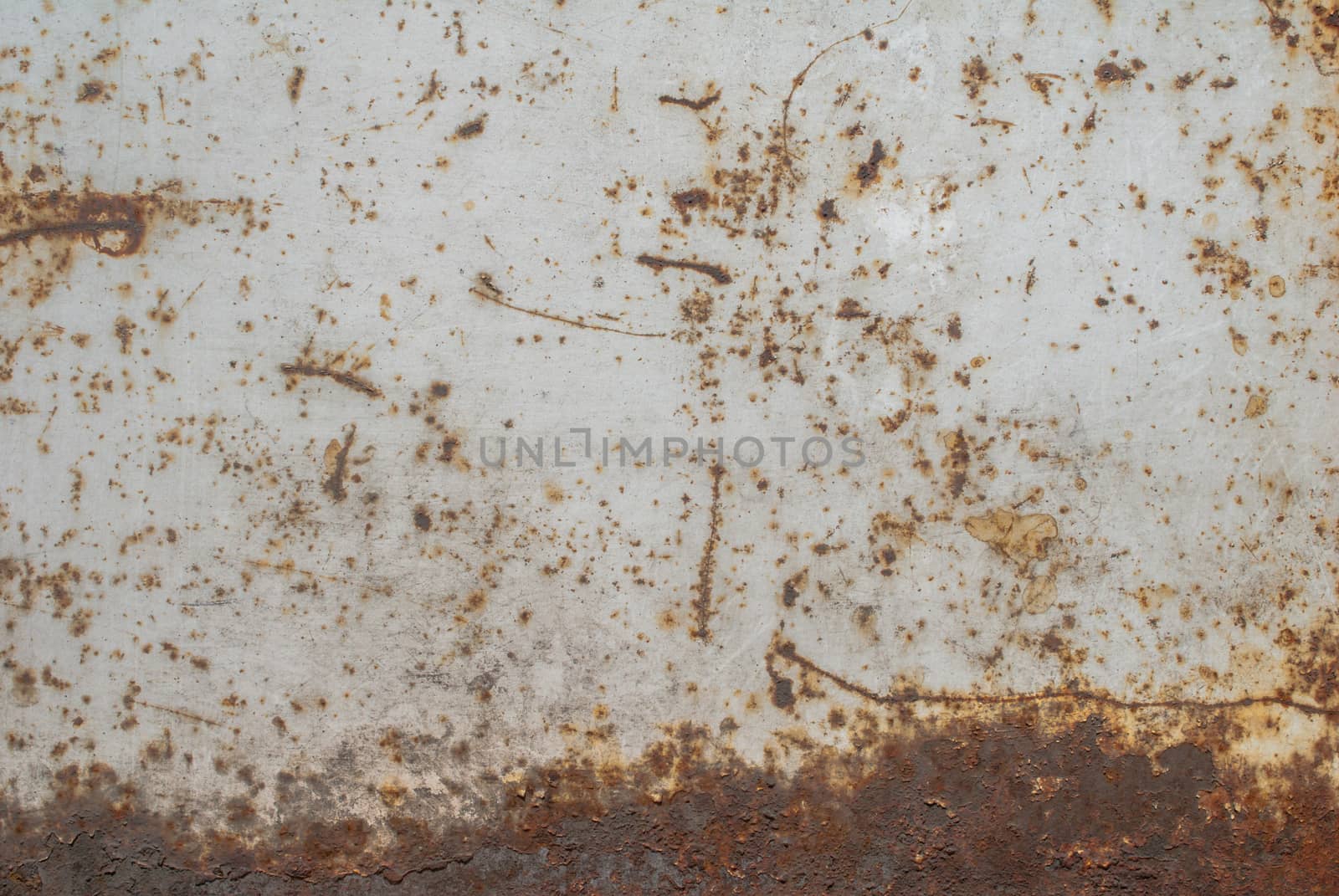 surface of rusty iron with remnants of old paint, grunge metal surface, great background or texture for your project by uvisni