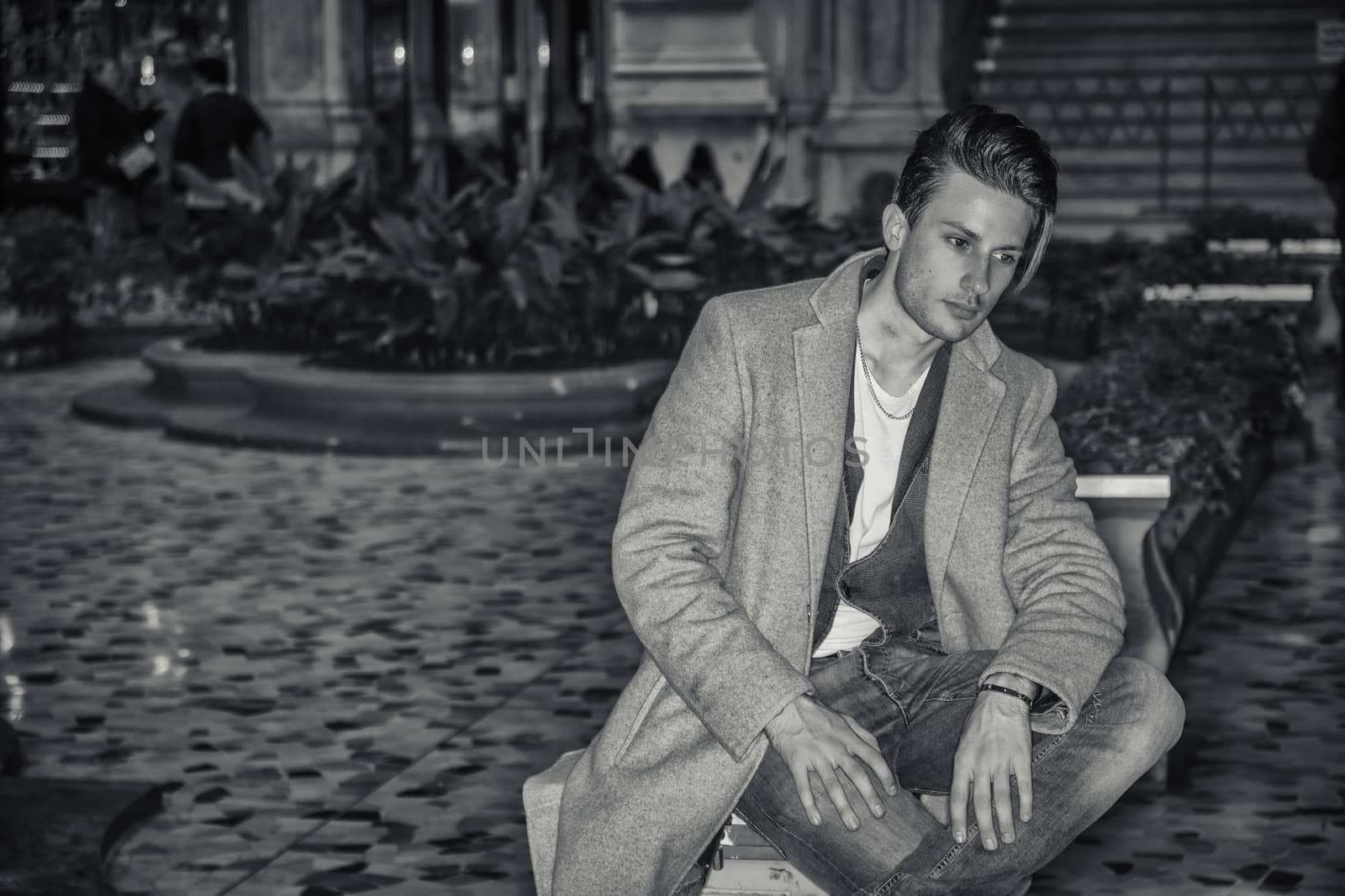 Elegant young man outdoor wearing wool coat by artofphoto
