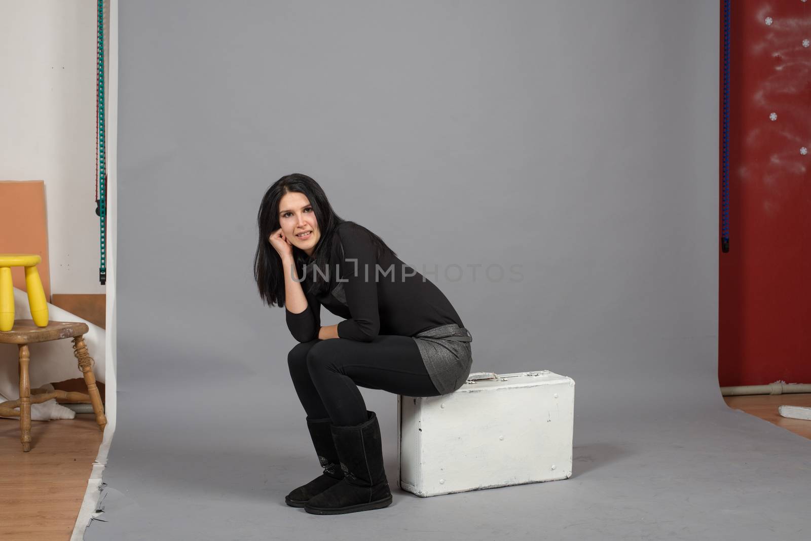 cute young girl on the shooting in the studio