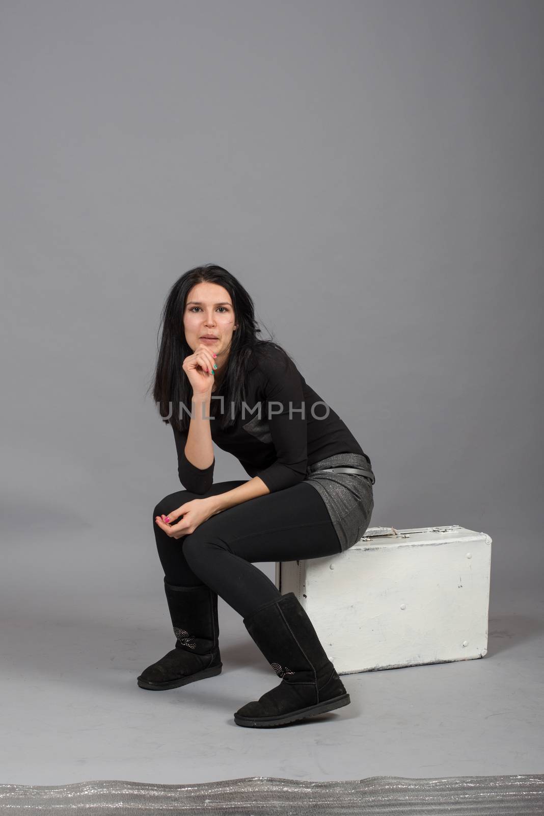 cute young girl on the shooting in the studio