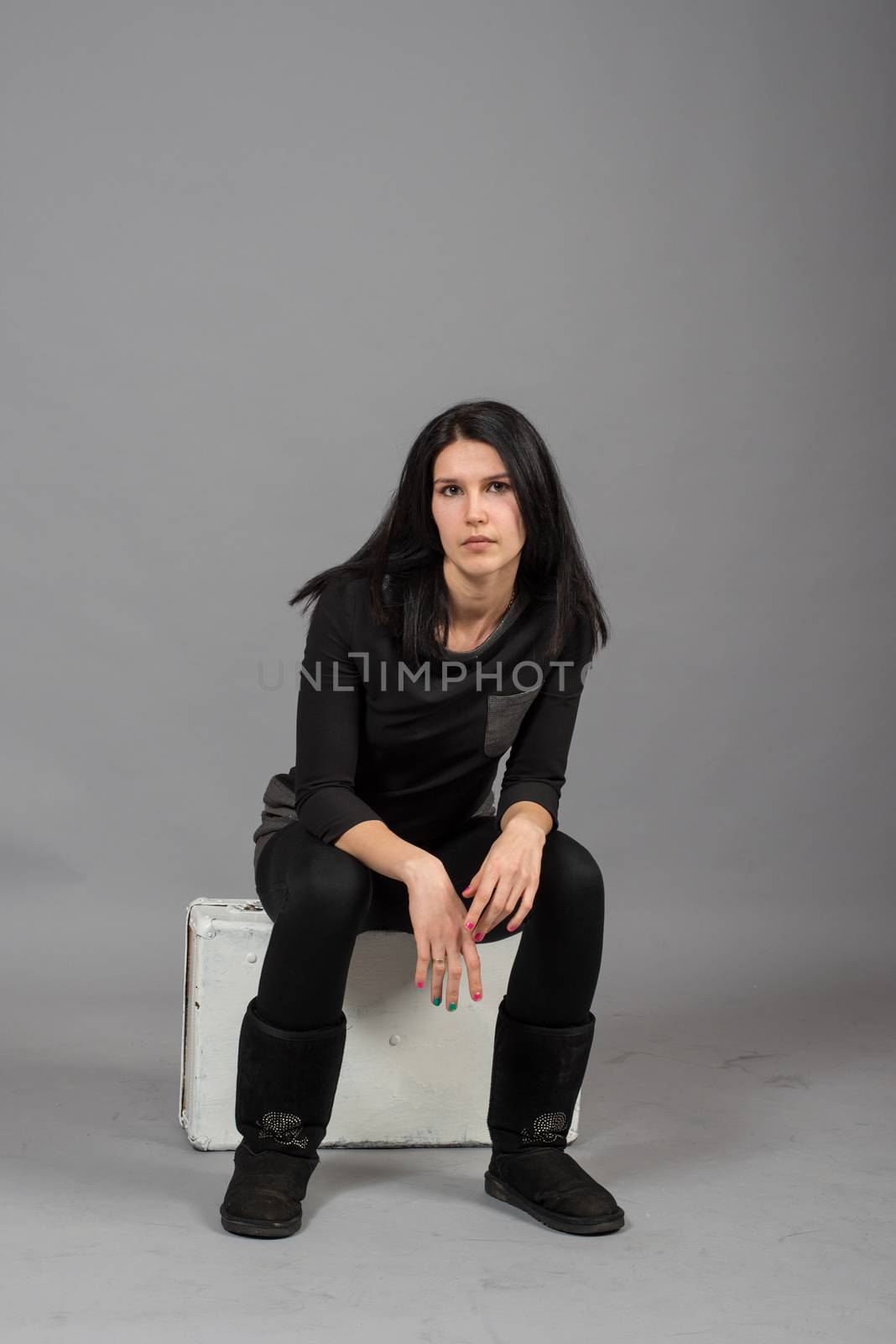 cute young girl on the shooting in the studio