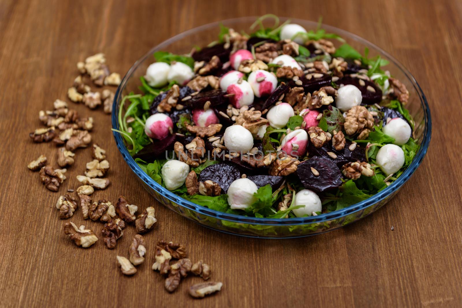 arugula salad with beet quail eggs and nuts