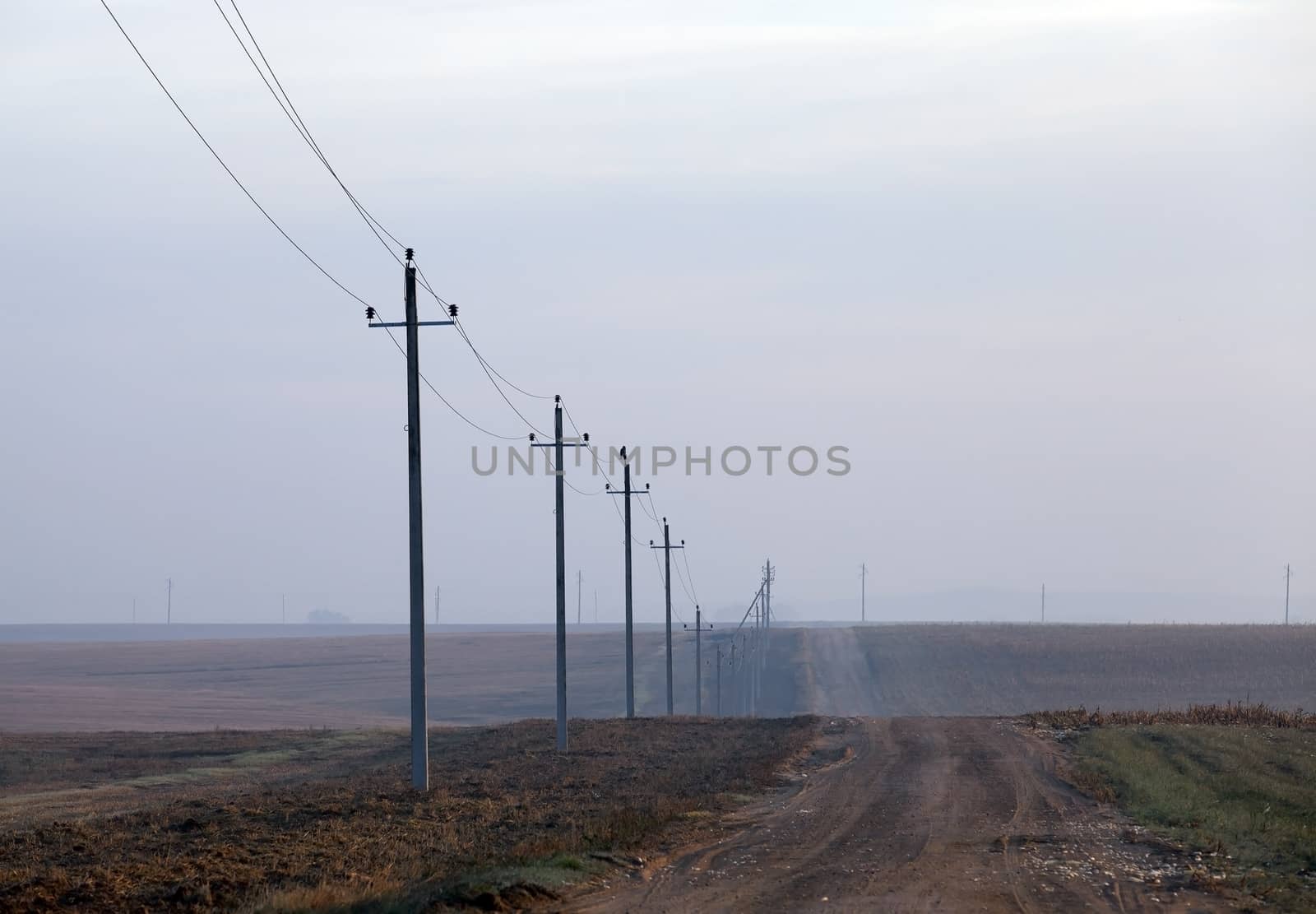 photographed close-up, high-voltage electric poles located in the countryside