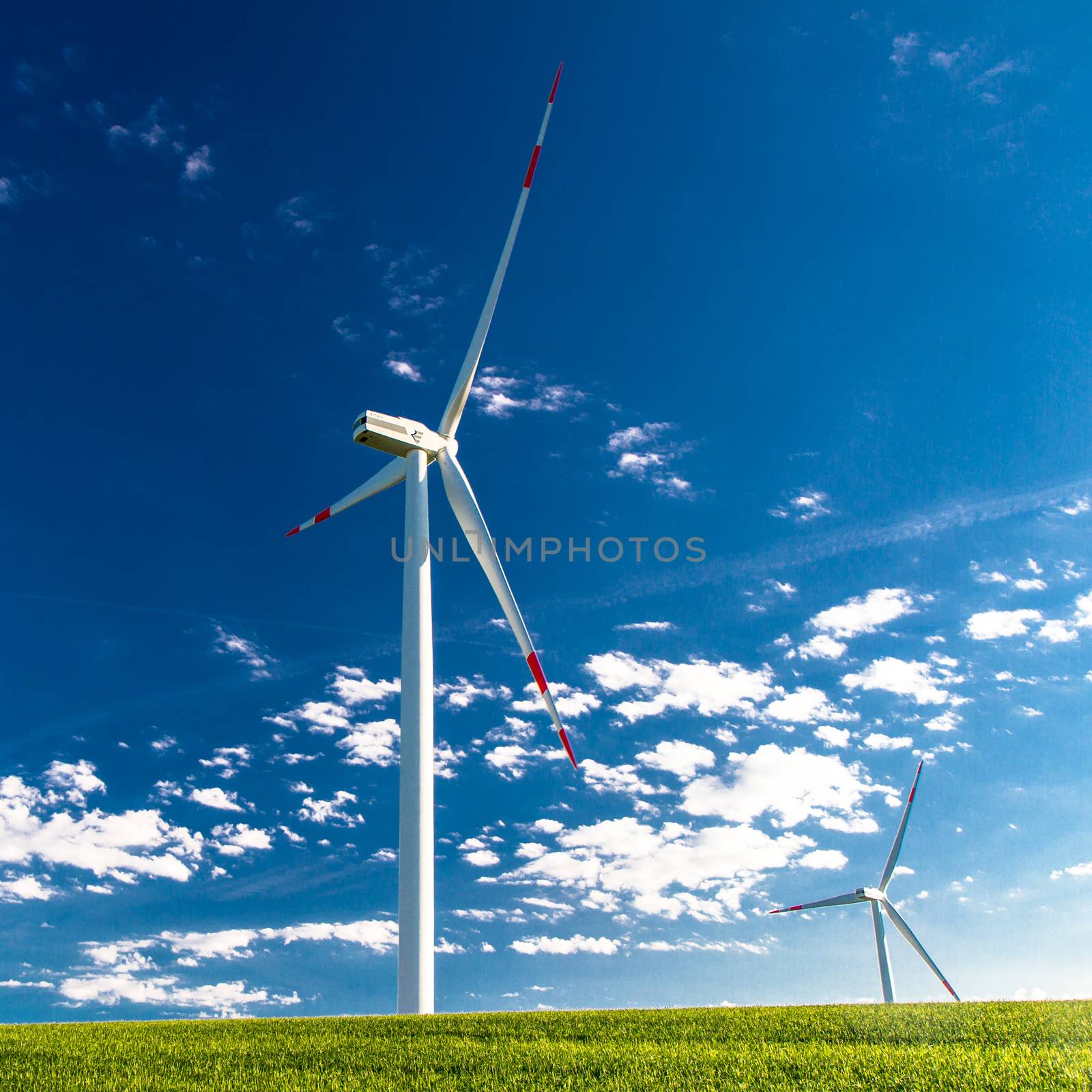 Windmills for electric power production. Green sustainable energy.