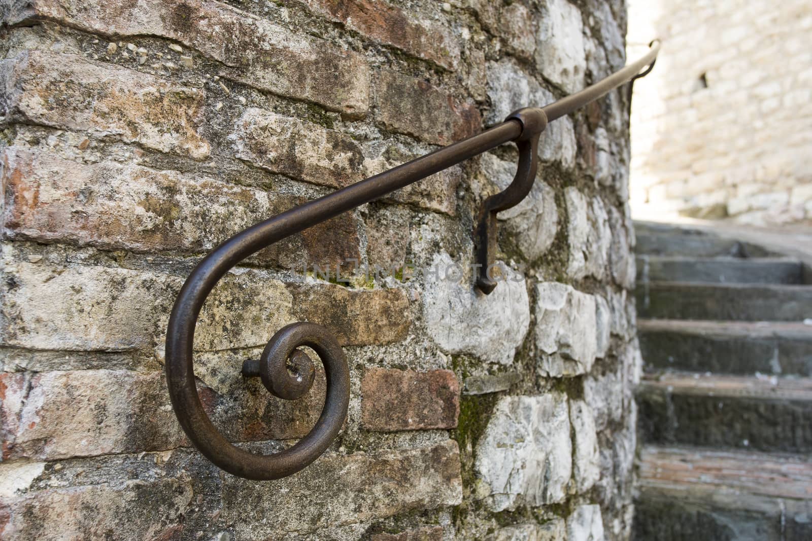 Close up view of an old wrought iron handrail of an Umbrian town