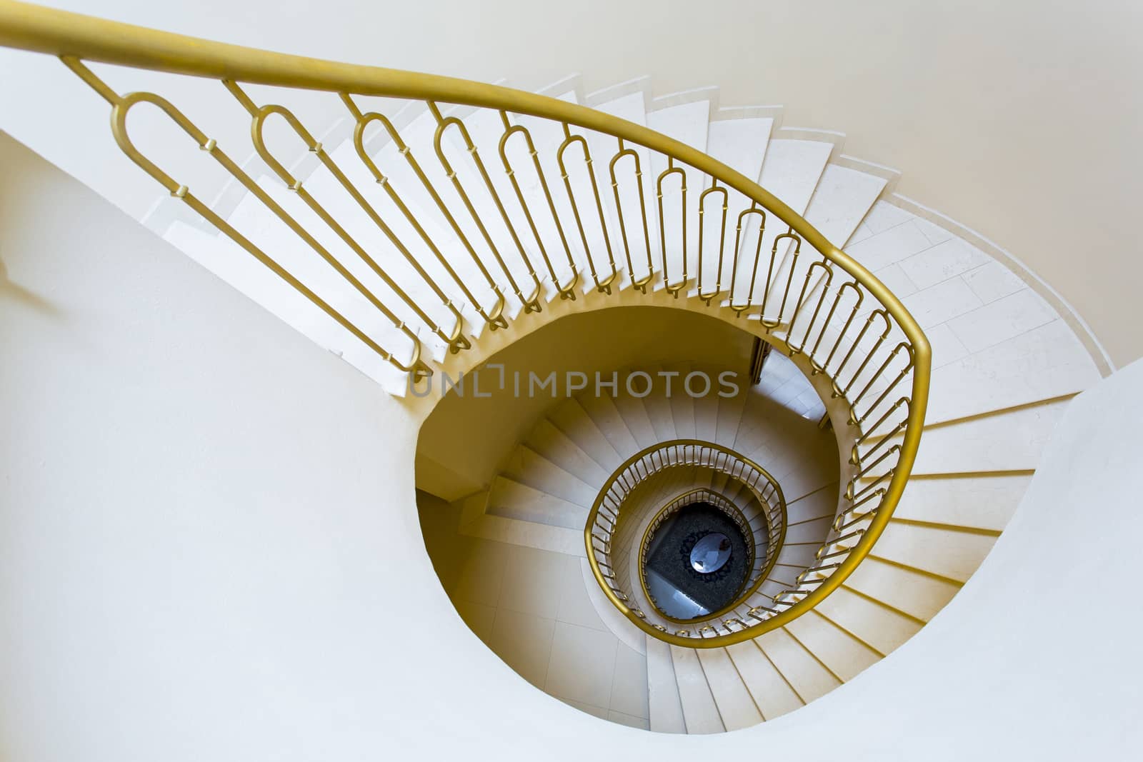 View from the top of a spiral staircase of an old Tuscan home