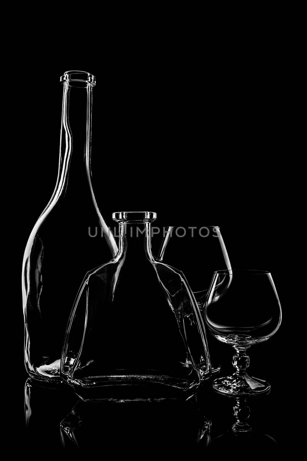 transparent bottle with glasses by Andreua