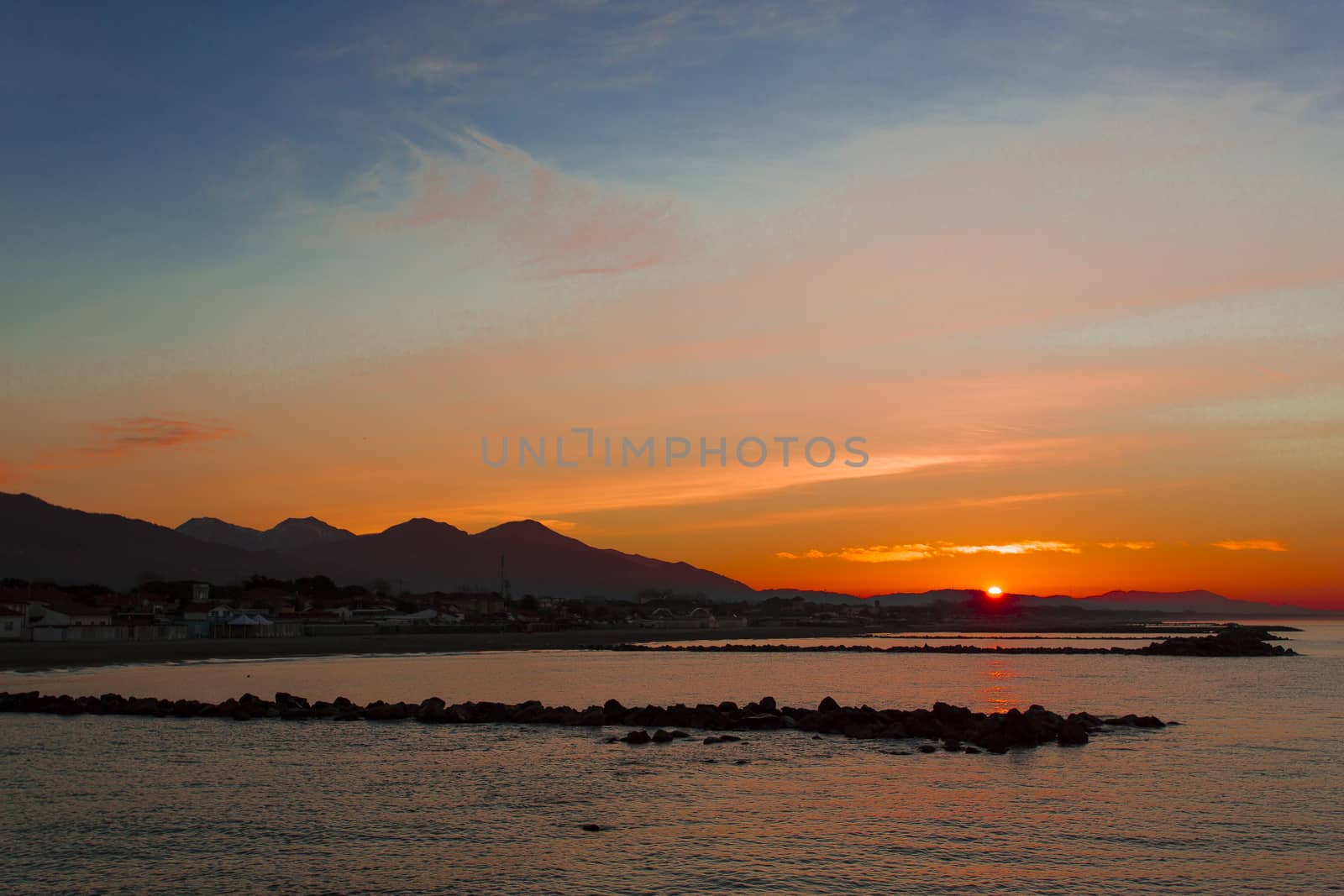 Special vision from the jetty of Marina di Massa to dawn of the new year