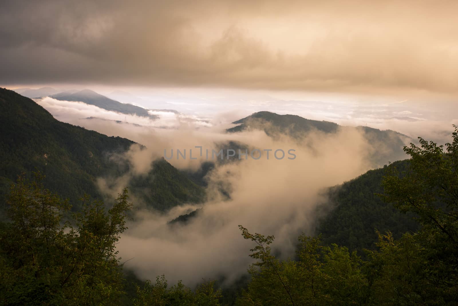 Panoramic view of the valley of Carrara covered by clouds