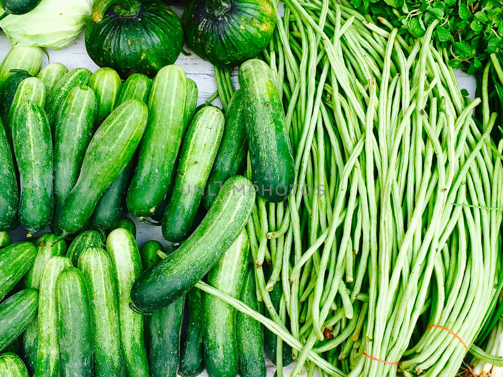 Fresh cucumber and  lentils organic vegetables by polarbearstudio