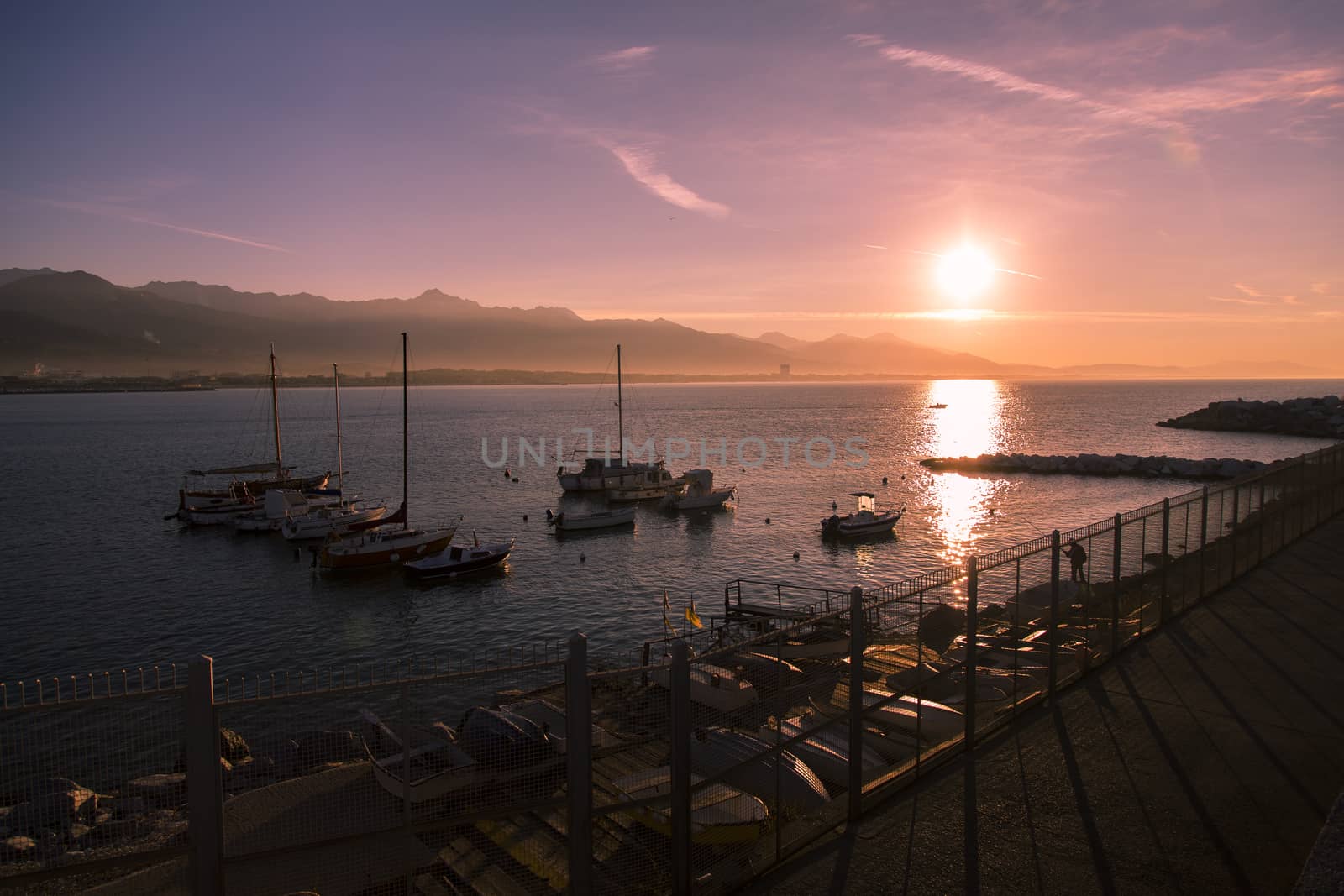 View of a small harbor with boats  moored