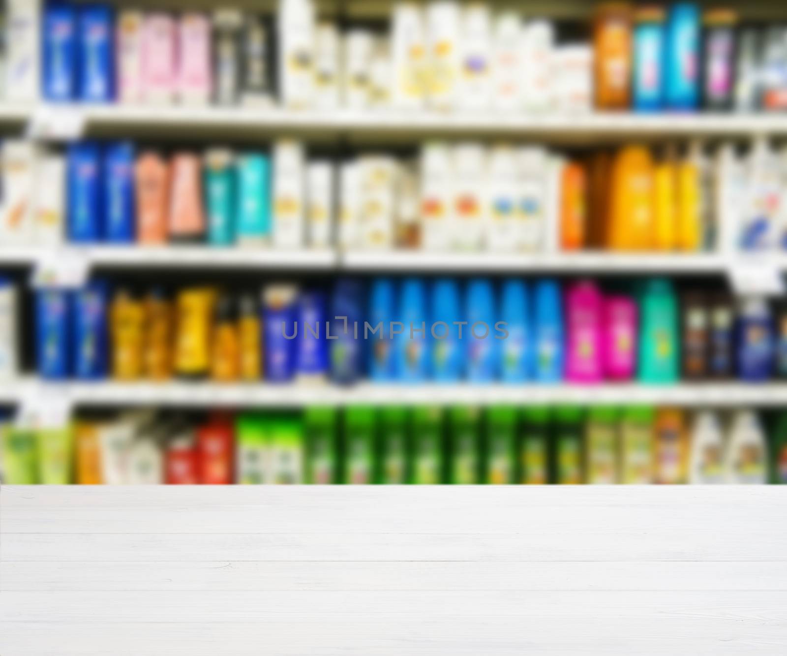 Wooden empty table in front of blurred supermarket by fascinadora