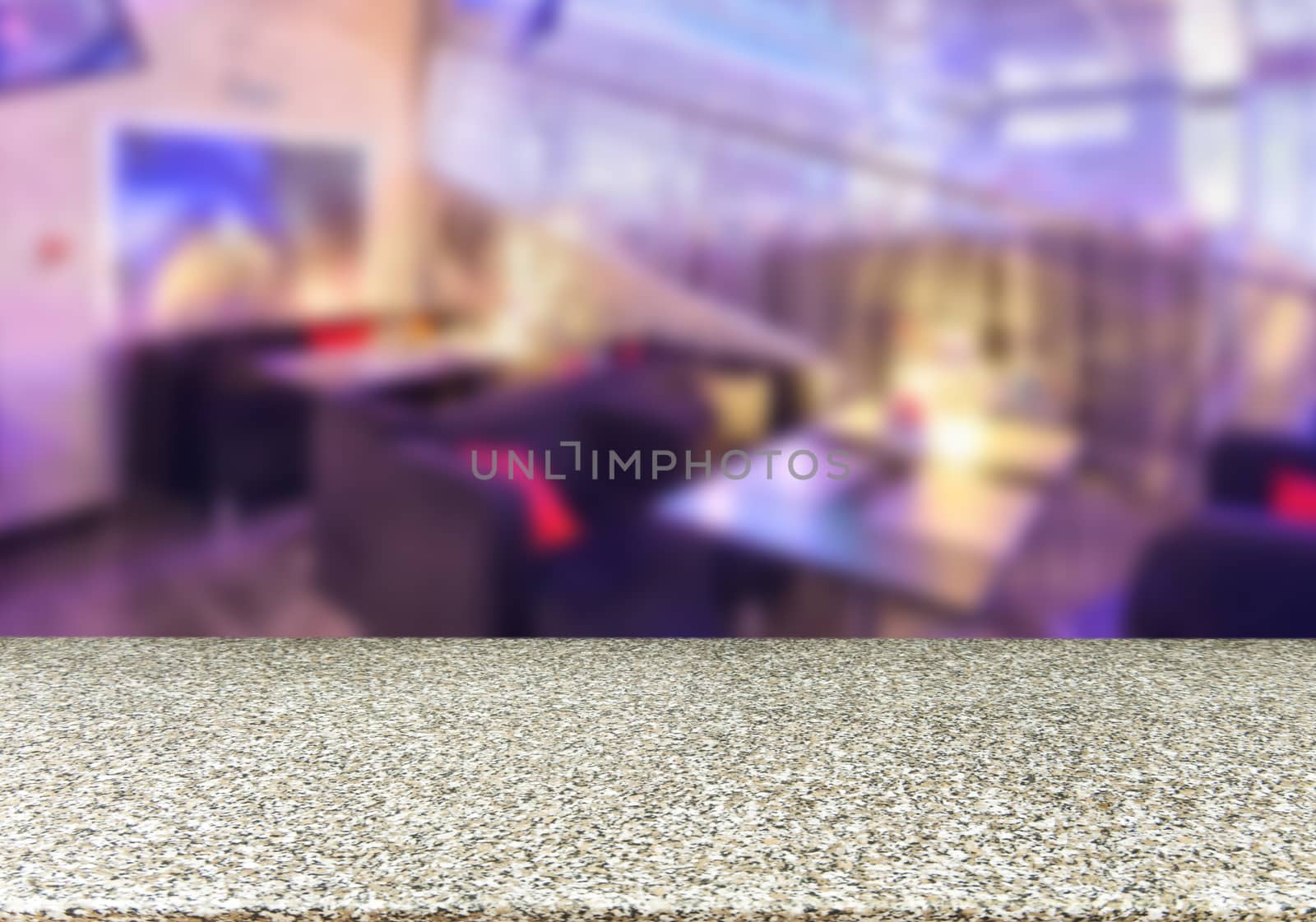 Marble board empty table in front of blurred background. Perspective marble table over blur in cafe interior - can be used for display or montage your products. Mockup your products