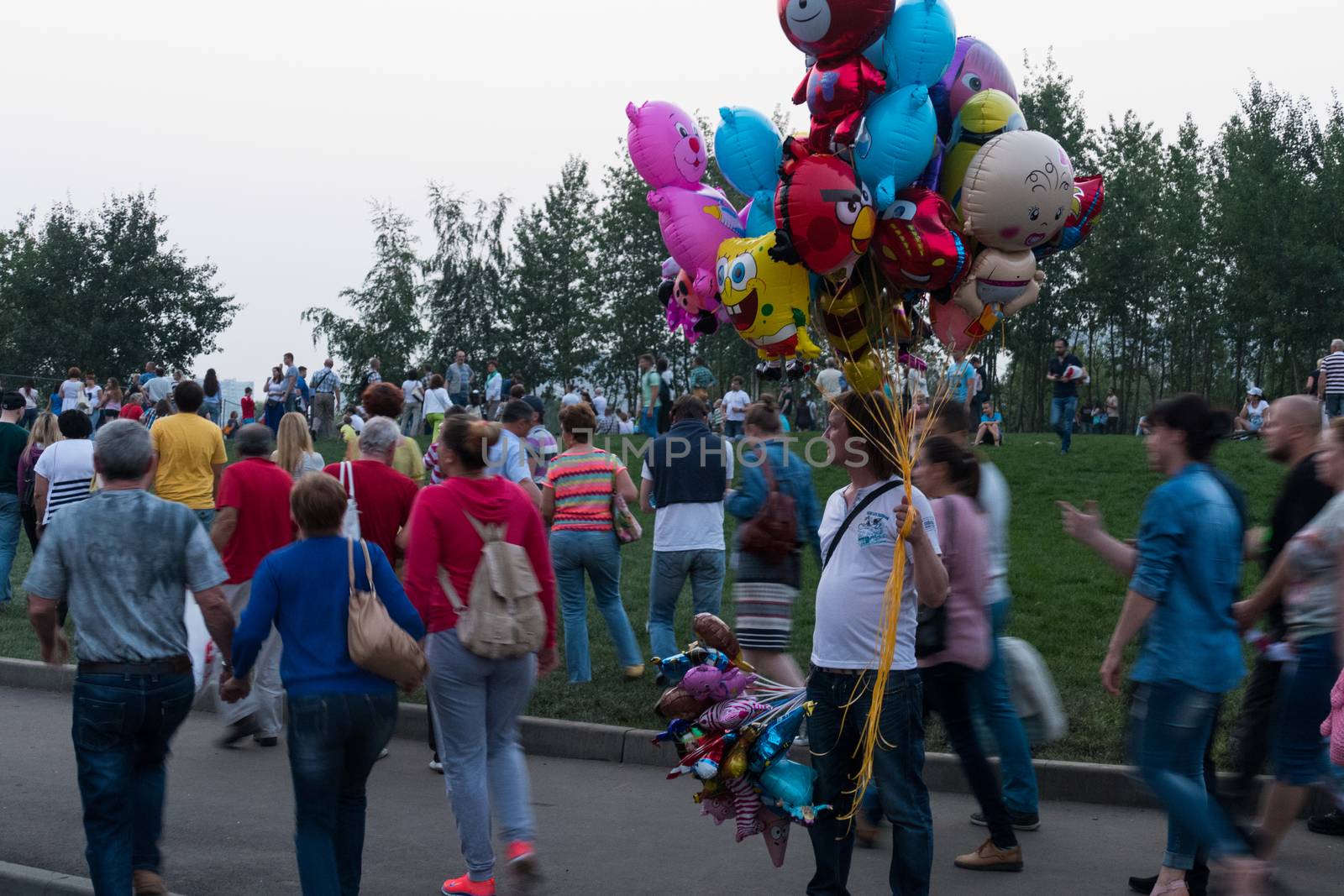 Seller balloons in crowd Russia ,Moscow. iuly 2016