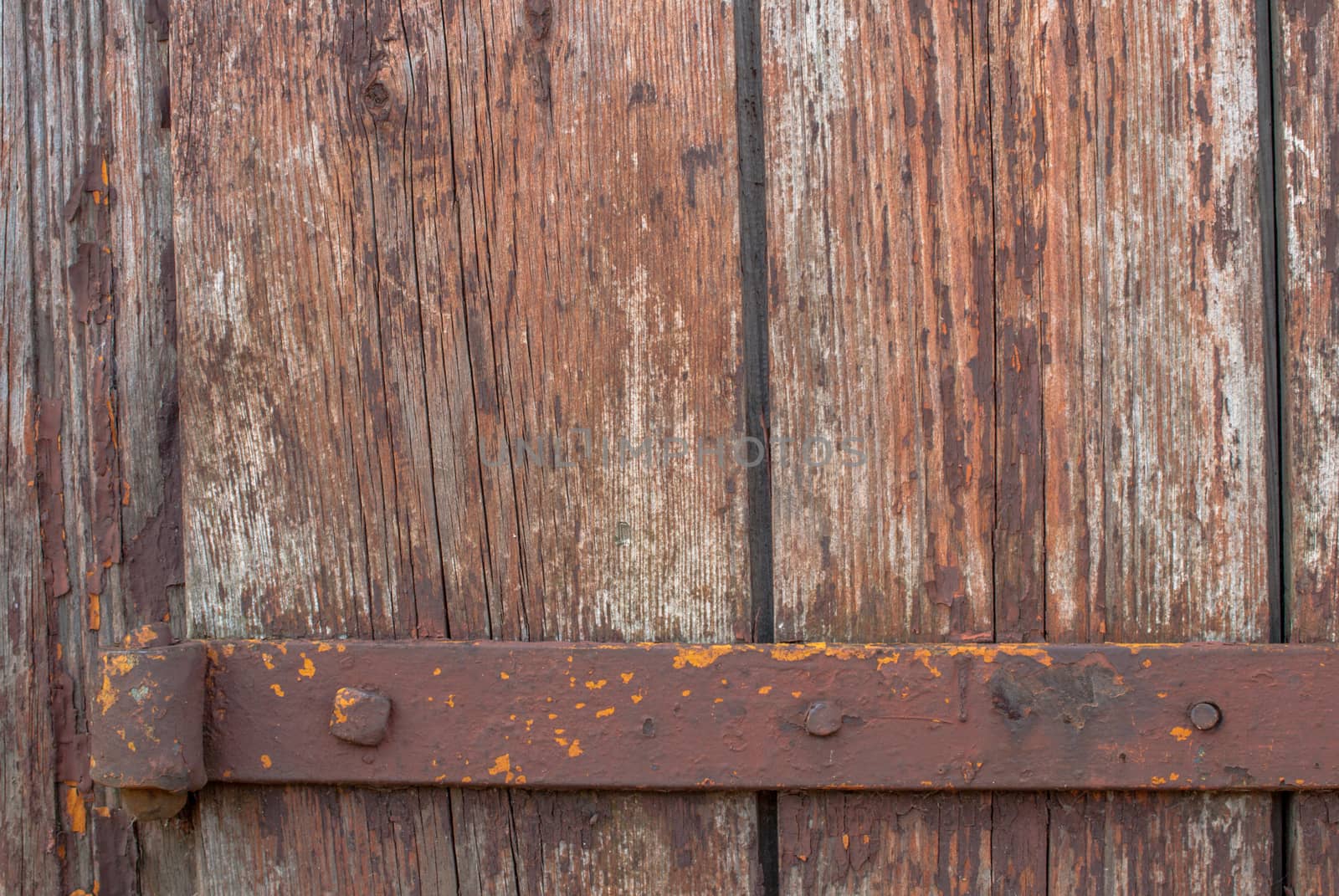 chipped paint on the door of the old boards, perfect background for your concept or project by uvisni