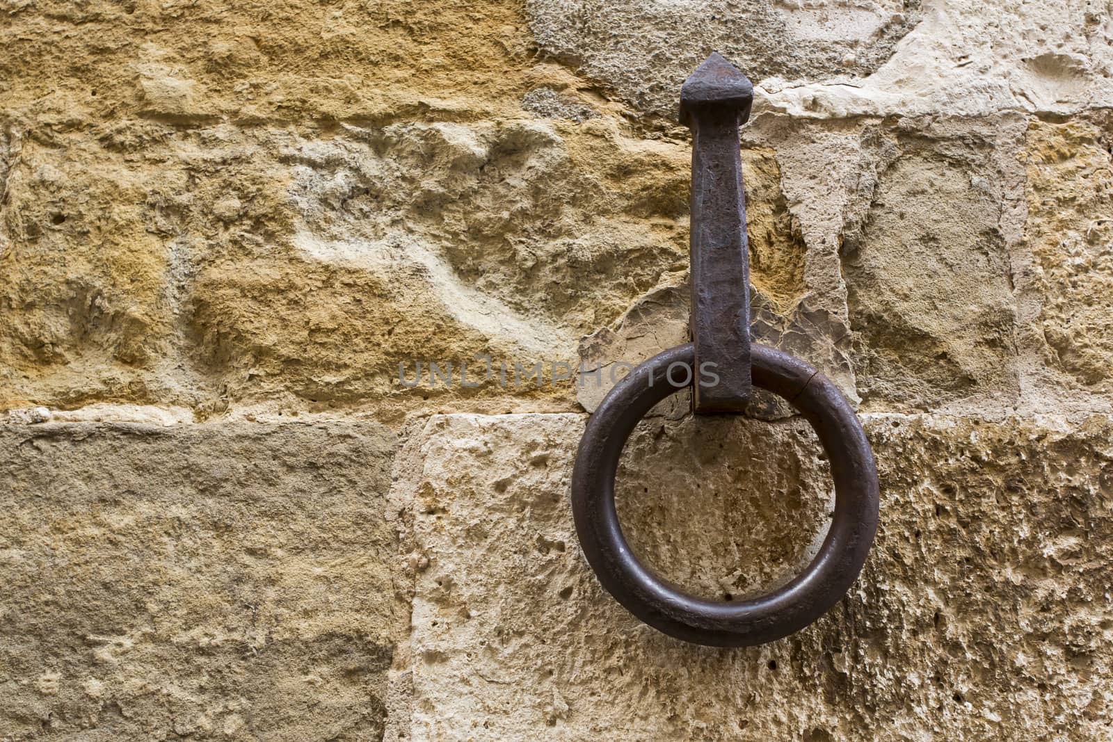 Close-up of an antique ring for tying horses