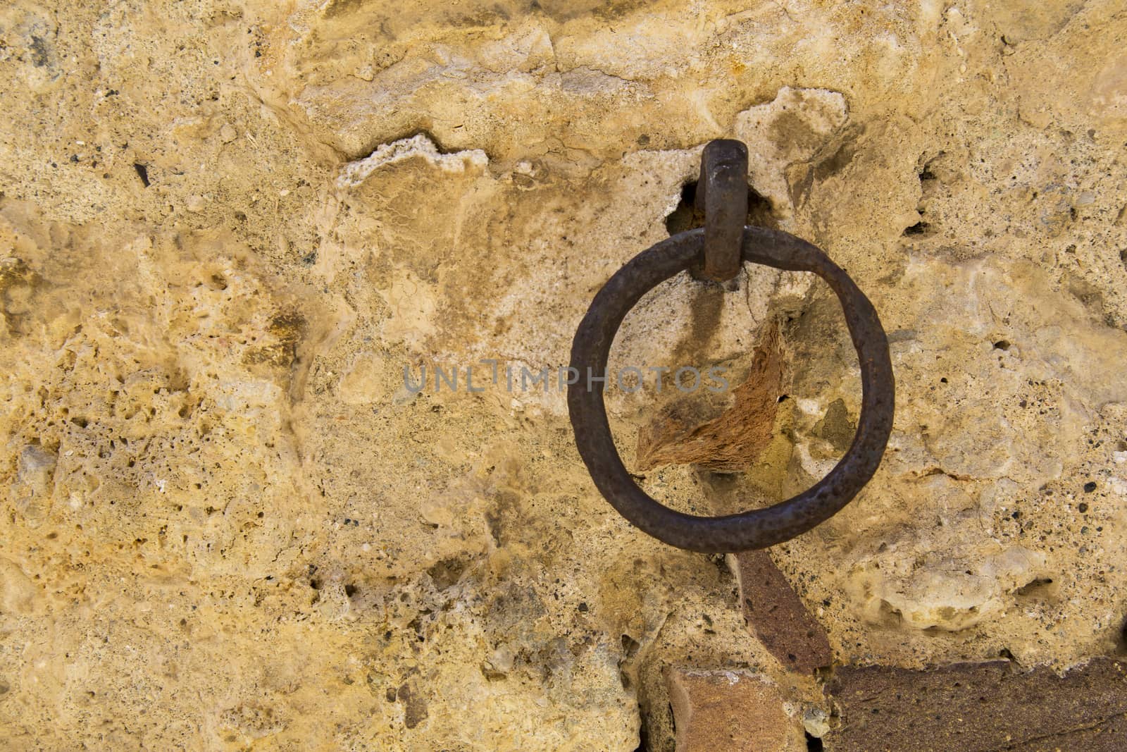 Close-up of an antique ring for tying horses