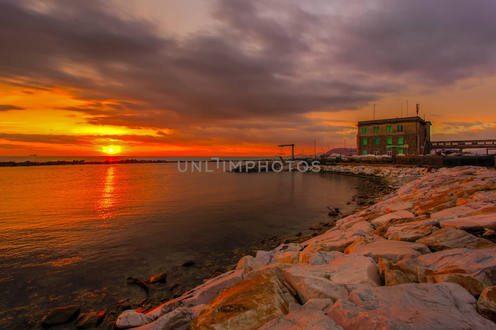 View of the sunset in Marina di Massa using the technique hdr