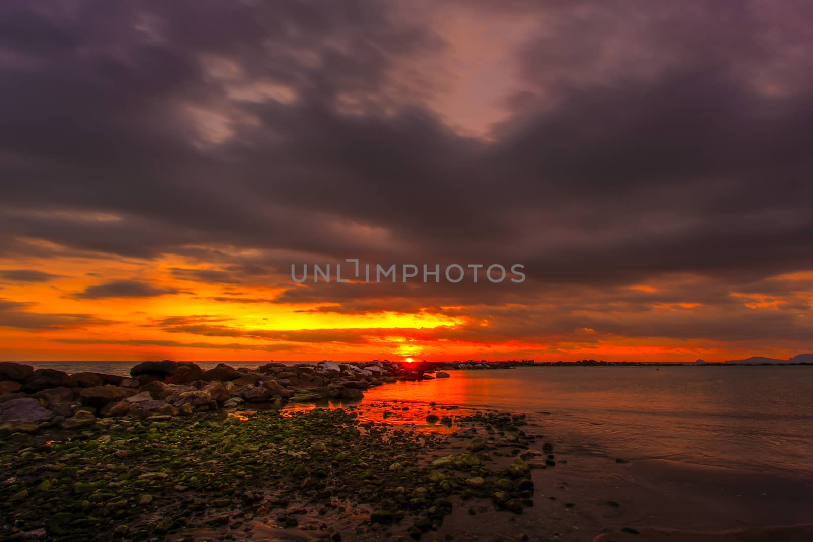 View of the sunset in Marina di Massa using the technique hdr