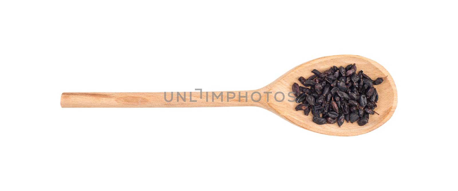 Spice barberry in wooden spoon isolated on white