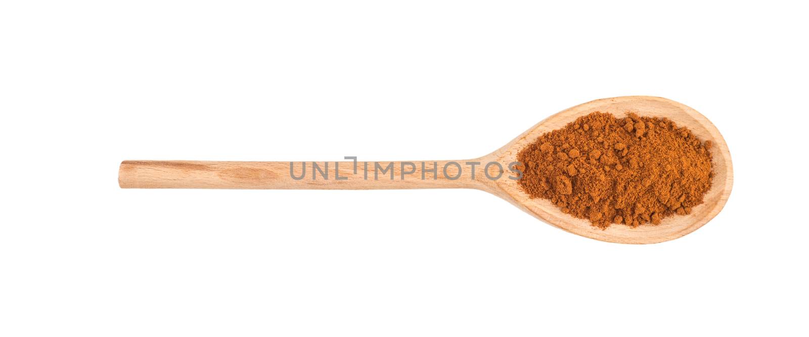 close up of pepper paprika seasoning in wooden spoon on white background with clipping path