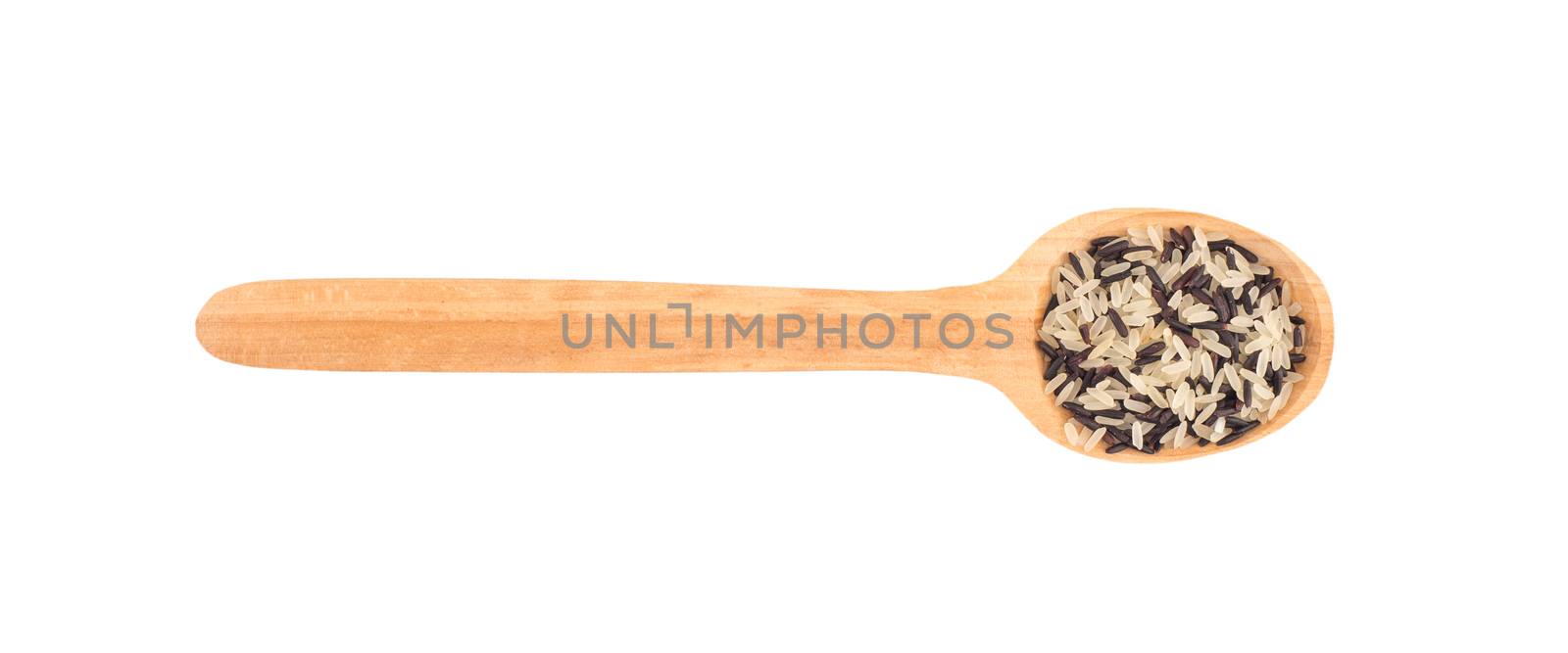 a mixture of types of rice in a wooden spoon