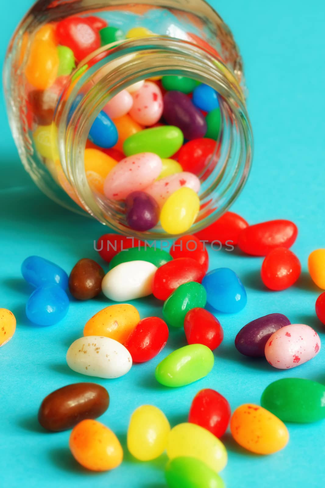 sweet and colorful jellybeans in a jar