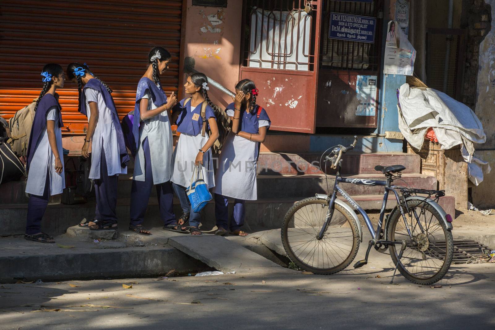 Documentary image. Pondicherry, Tamil Nadu,India - May 12 2014. School students in school, out school, in groups, with uniforms. In government school