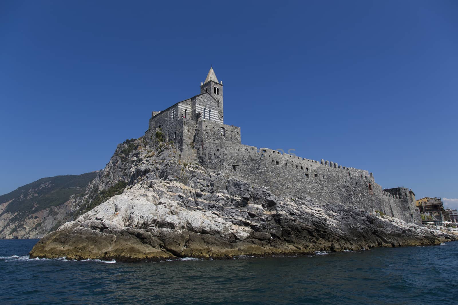 View of a church overlooking the sea in a tourist resort