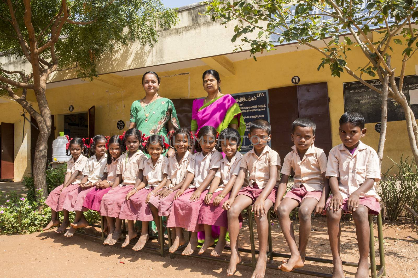 Documentary image. Pondicherry, Tamil Nadu,India - May 12 2014. School students in school, out school, in groups, with uniforms. In government school