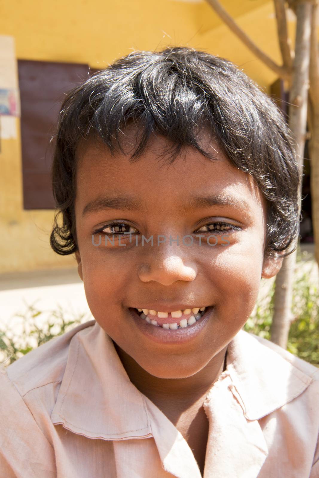 Documentary image. Pondicherry, Tamil Nadu,India - May 12 2014. School students in school, out school, in groups, with uniforms. In government school