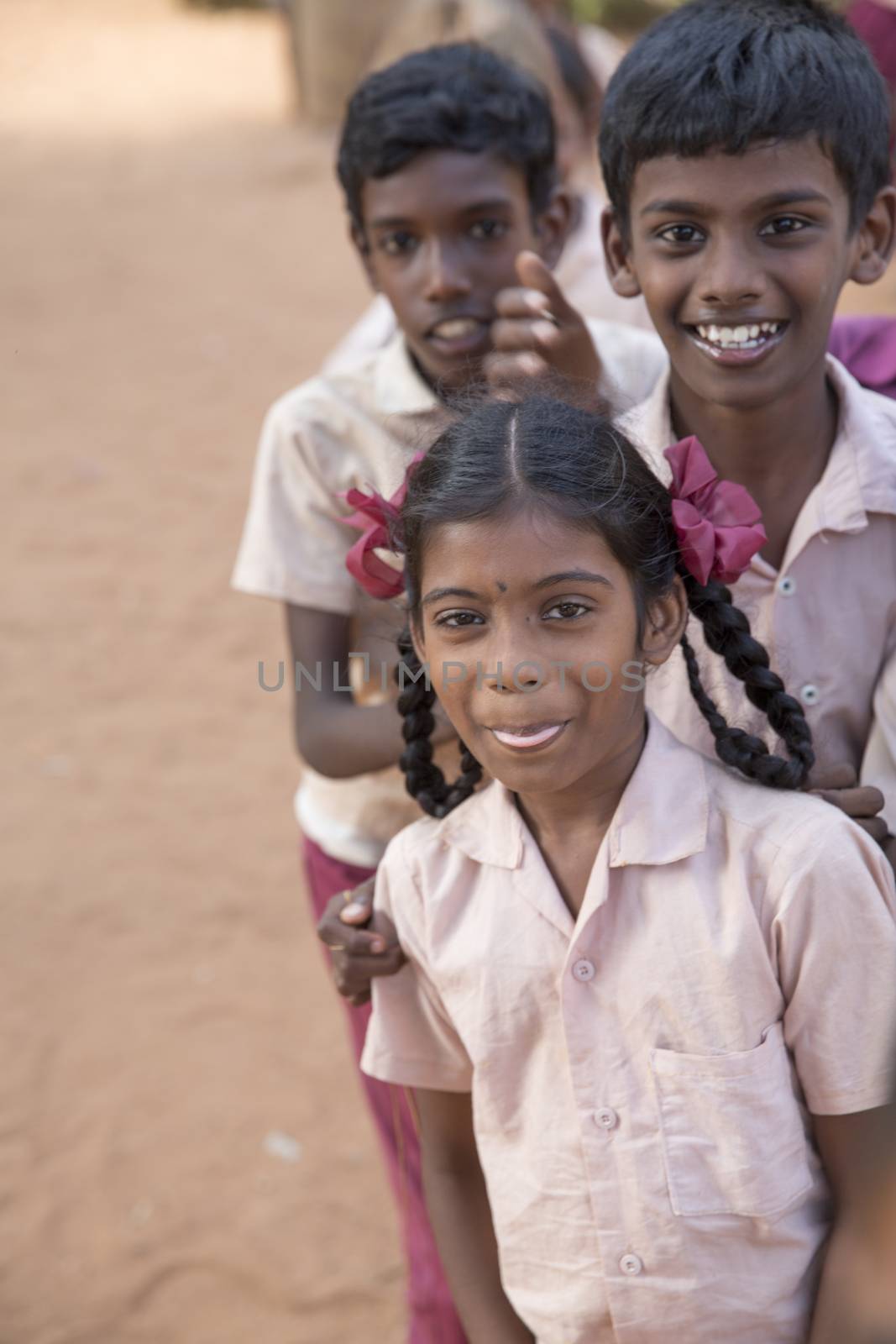 Documentary image. Pondicherry, Tamil Nadu,India - May 12 2014. School students in school, out school, in groups, with uniforms. In government school