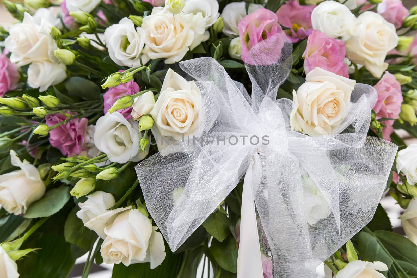 Close-up view of a bridal bouquet made of roses pale roses