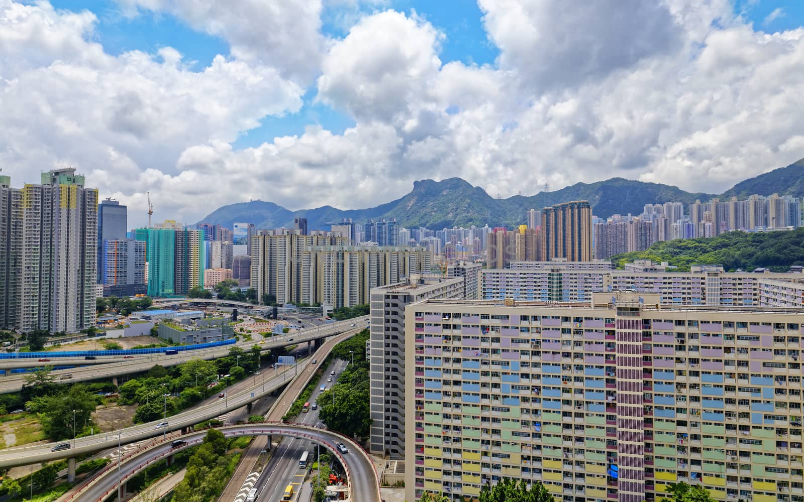 hong kong public estate with landmark lion rock by cozyta