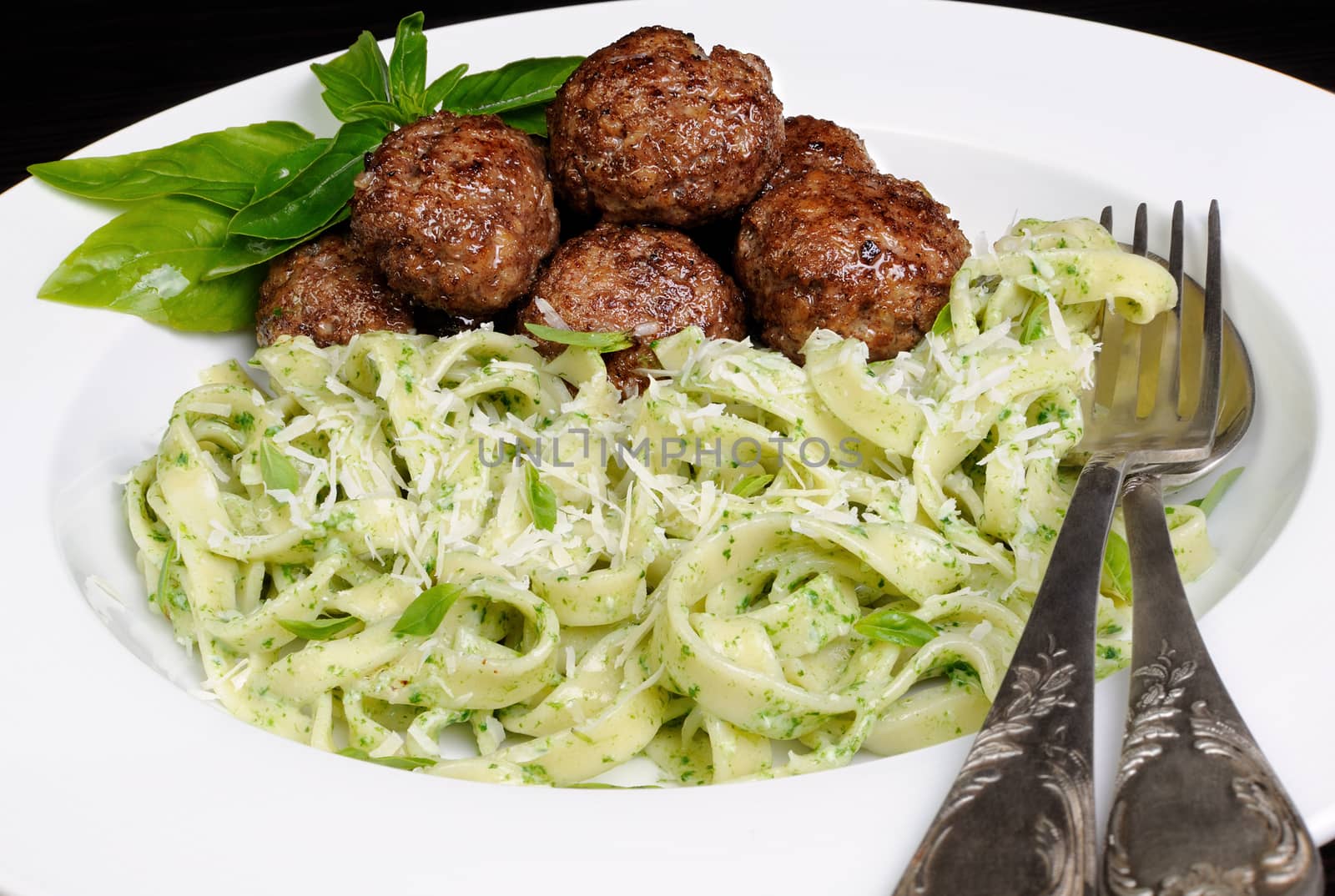 Meatballs with pasta sauce avocado,  parmesan and basil