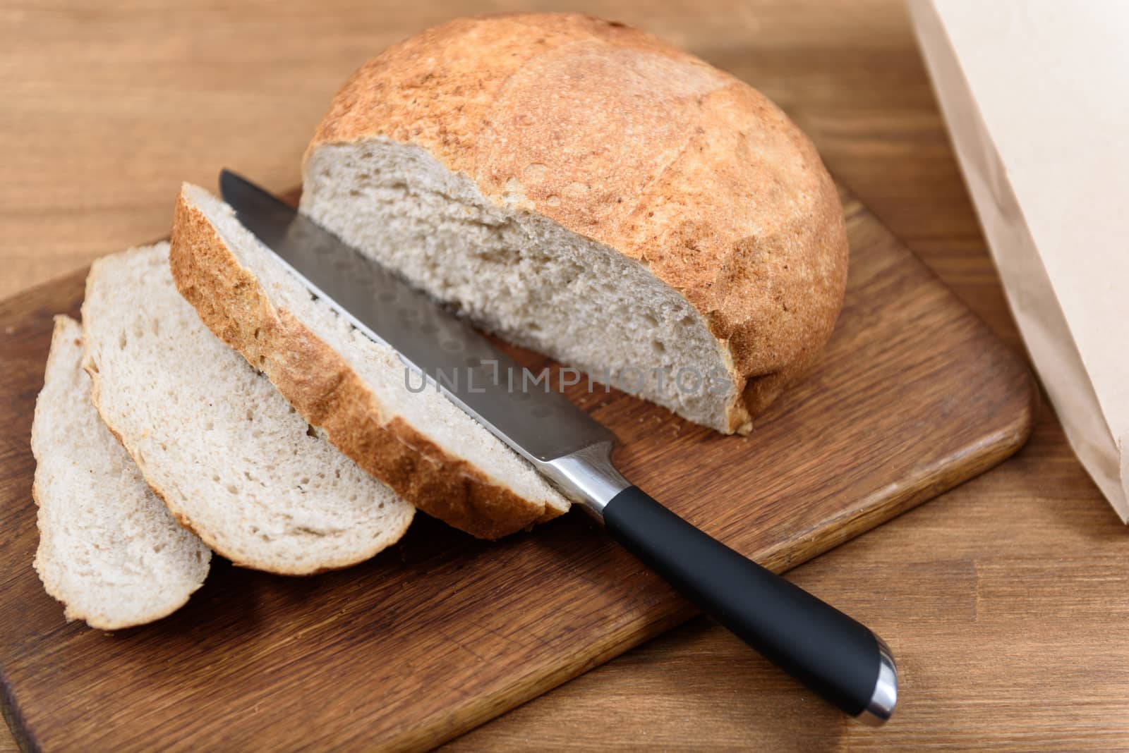 grain bread is sliced on the Board