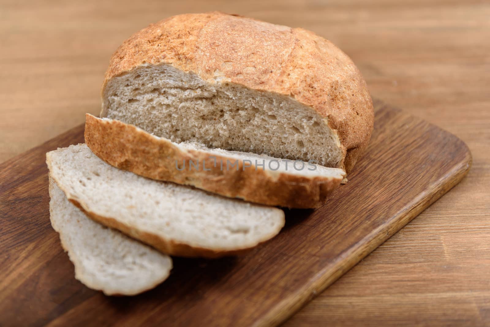 grain bread is sliced on the Board