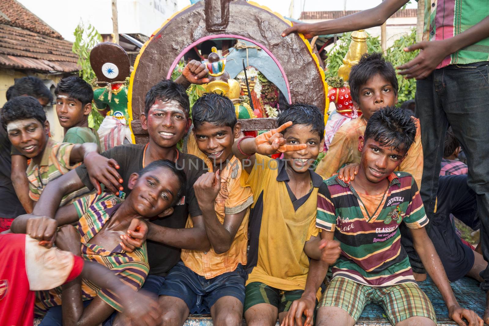 Pondicherry, Tamil Nadu,India - May 15, 2014 : each year in villages, people celebrate the temple fest, for the full day. They walk in groups, they launch paint on people, play music.