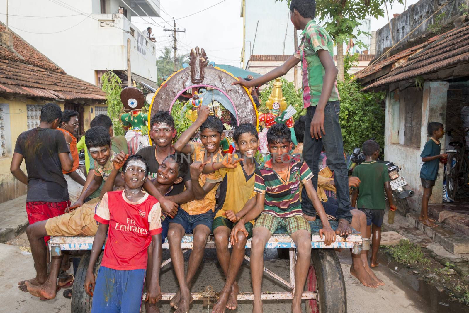 Pondicherry, Tamil Nadu,India - May 15, 2014 : each year in villages, people celebrate the temple fest, for the full day. They walk in groups, they launch paint on people, play music.