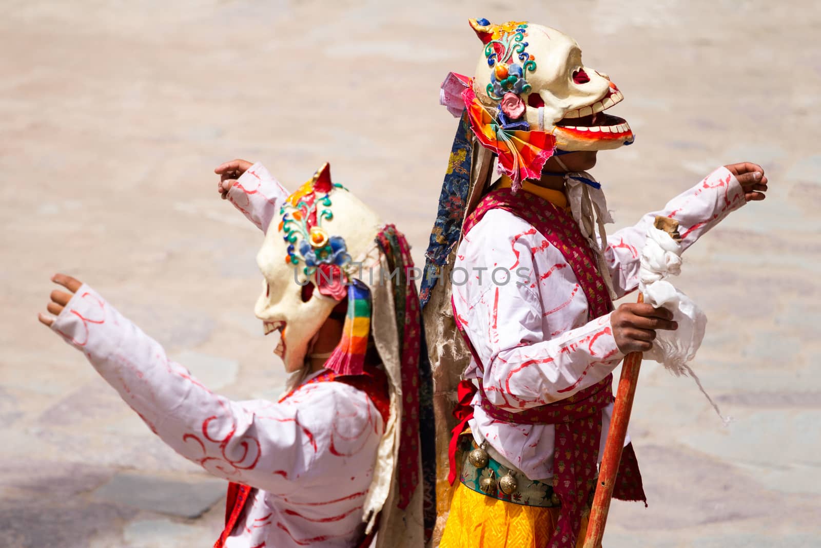 Unidentified monks performs a religious masked and costumed mystery dance of Tibetan Buddhism during the Cham Dance Festival in Hemis monastery, India