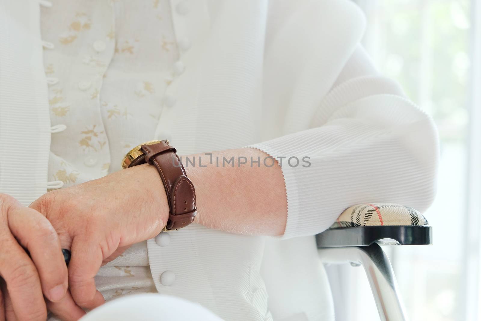image of elderly woman in wheelchair close up