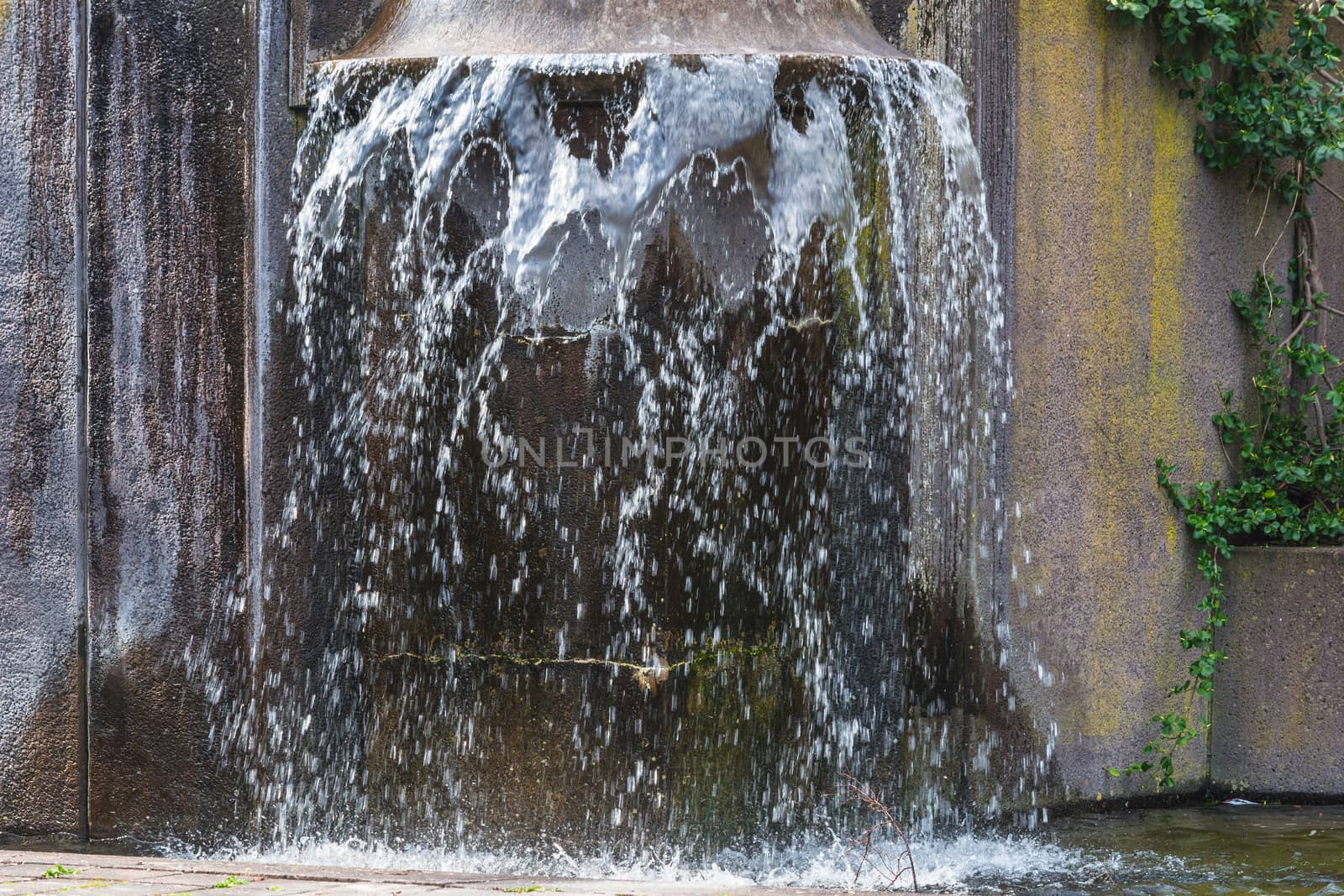 Artificially designed waterfall, fountain - Fountain in a park.