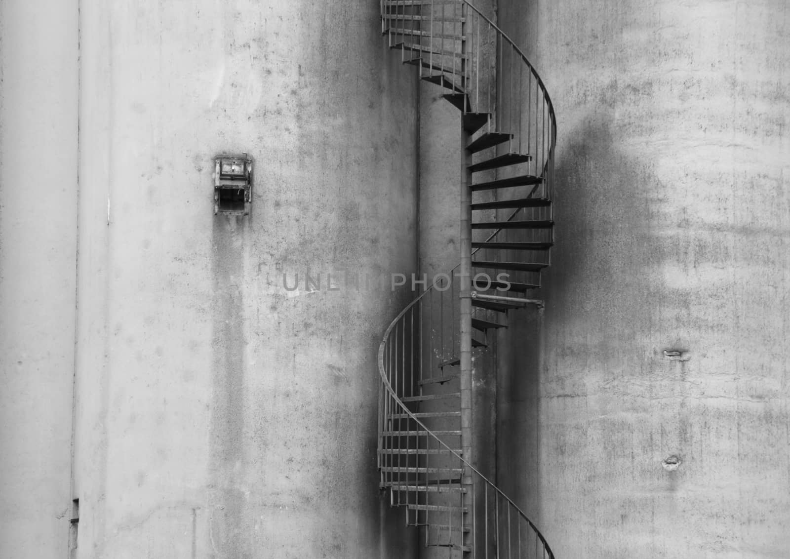 Abstract Closeup of Outdoor Metal Staircase on Concrete Grey Wall