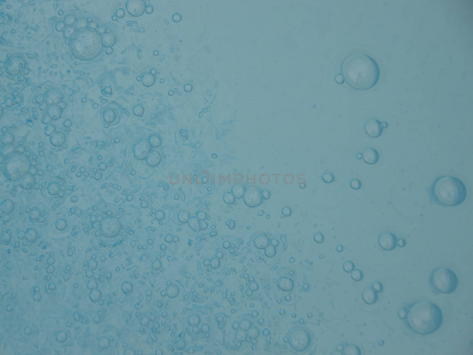 Deep Light Blue Swimming Pool Water with One Large Bubble Background Abstract Pattern