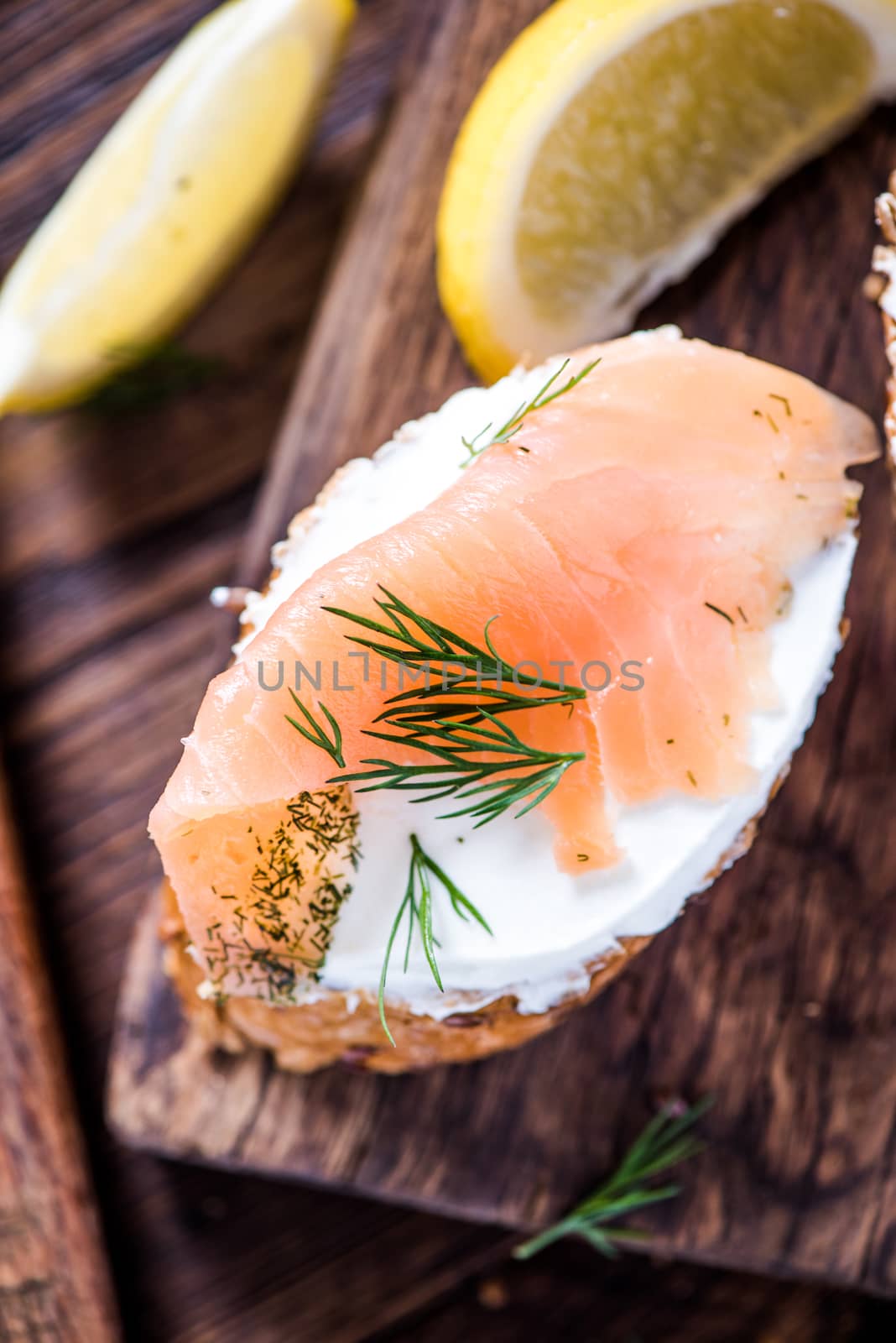 Healthy breakfast salmon with cottage cheese on serving board