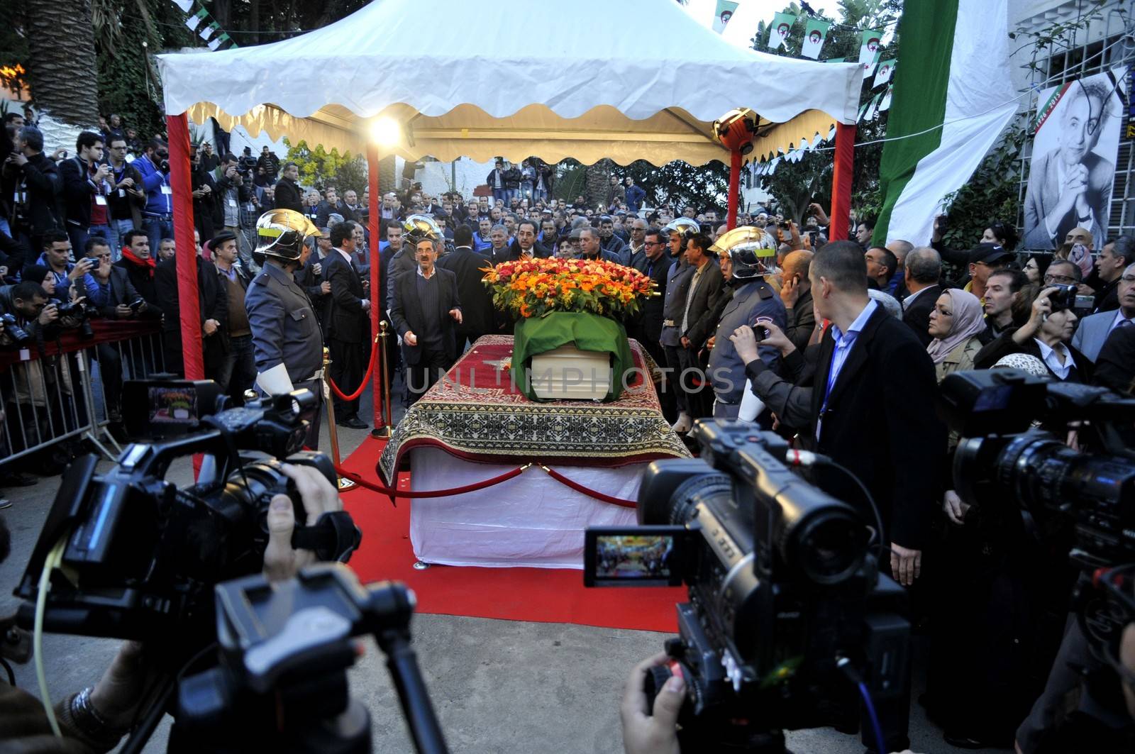 ALGERIA, Algiers : Algerians pay tribute to late Algerian opposition figure Hocine Ait-Ahmed, on December 31, 2015 in the capital Algiers after his body was brought to his homeland for a state funeral. Ait-Ahmed, one of the fathers of Algeria's struggle for independence from France and then a longtime opposition figure, died in Lausanne, Switzerland on December 23, his Socialist Forces Front party said. Ait-Ahmed, 89, was the last of the nine so-called sons of Toussaint, who launched the uprising in November 1954.