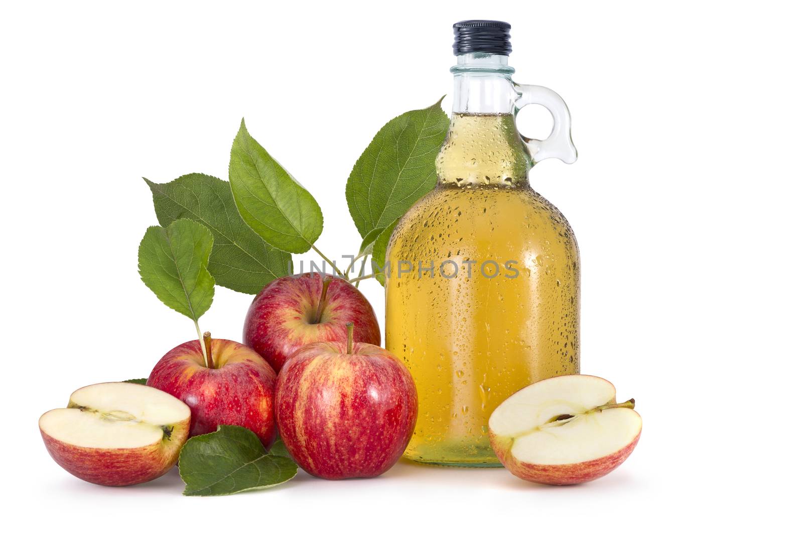 Cider and red apples with green leaves on white background